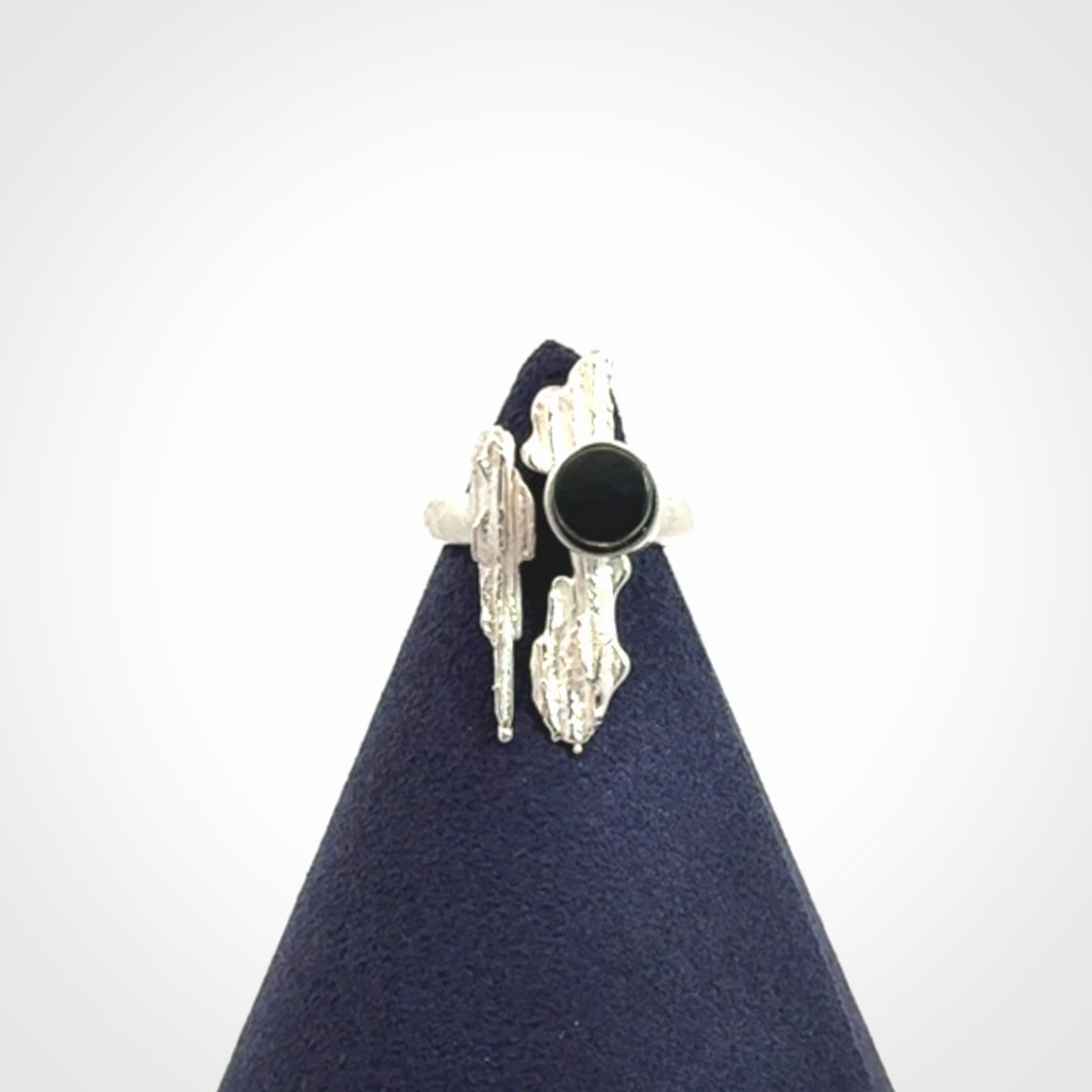 This is a handcrafted New Zealand Pounamu, Jade and sterling silver ring