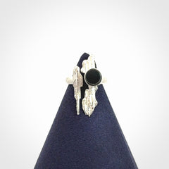 This is a handcrafted New Zealand Pounamu, Jade and sterling silver ring