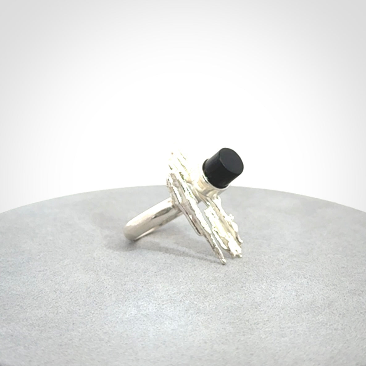 This is a handcrafted New Zealand Pounamu, Jade and sterling silver ring