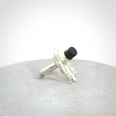 This is a handcrafted New Zealand Pounamu, Jade and sterling silver ring