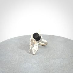 This is a handcrafted New Zealand Pounamu, Jade and sterling silver ring