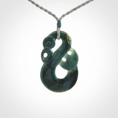 Hand carved Guatemalan Jadeite Manaia Pendant