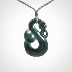 Hand carved Guatemalan Jadeite Manaia Pendant