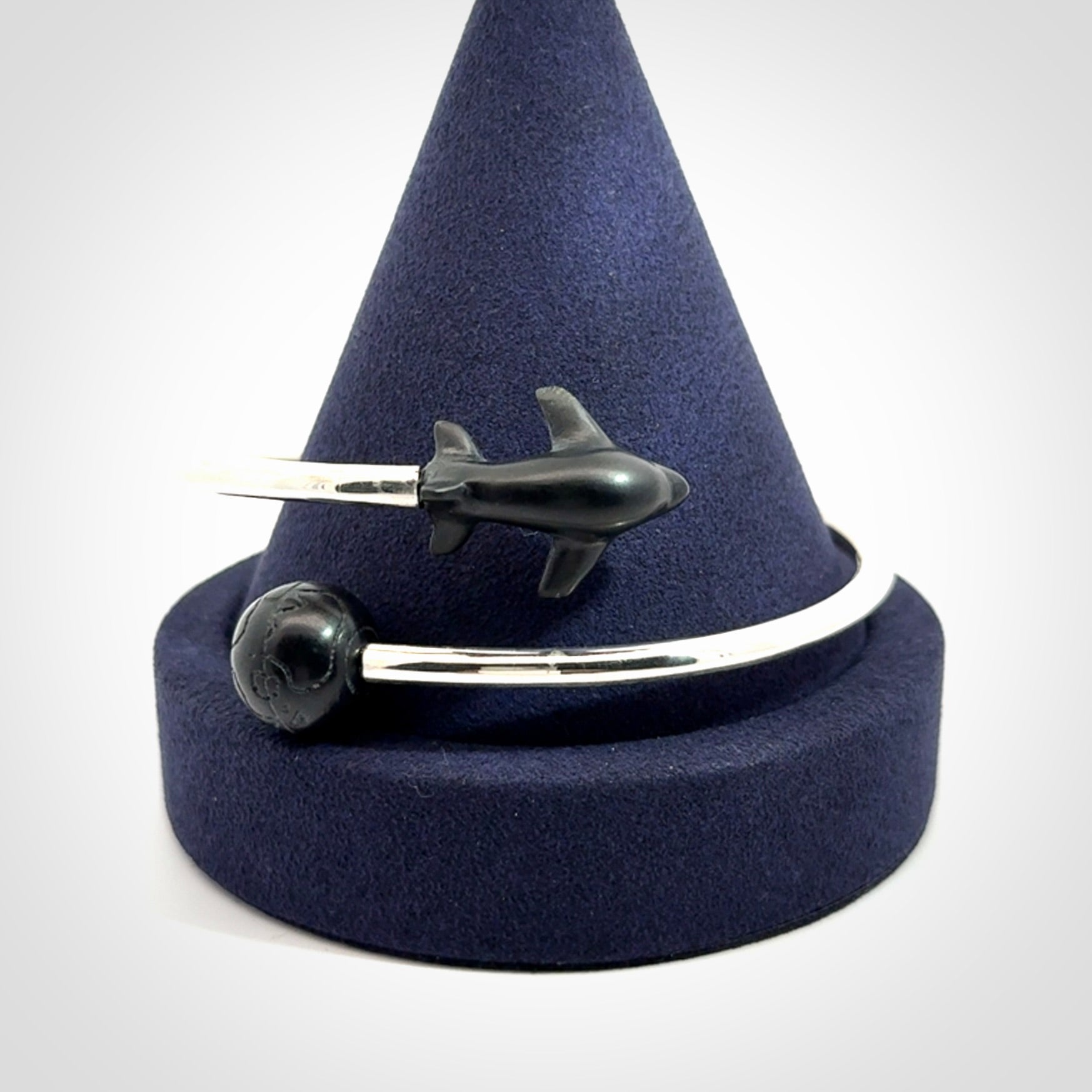 Hand carved plane and globe bracelet from Australian Black Jade with Sterling Silver. This is a very cool piece of wrist jewellery, hand made by NZ Pacific. We provide this with Free Postage Worldwide. Adjustable bracelets for men and women.