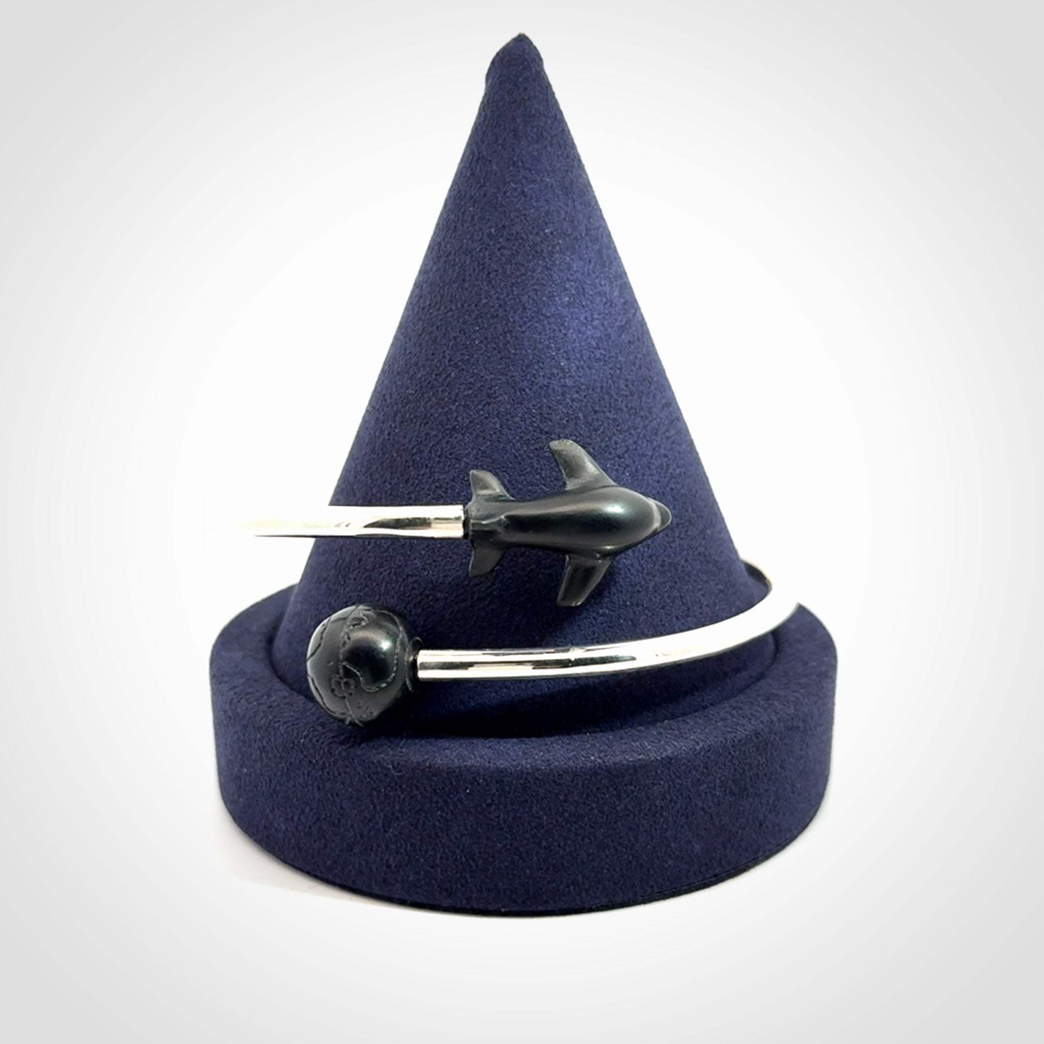 Hand carved plane and globe bracelet from Australian Black Jade with Sterling Silver. This is a very cool piece of wrist jewellery, hand made by NZ Pacific. We provide this with Free Postage Worldwide. Adjustable bracelets for men and women.