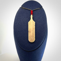Hand carved Woolly Mammoth Tusk feather pendant. Art to Wear. Provided with adjustable cord.