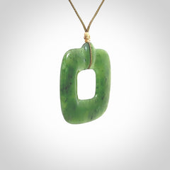 Hand carved British Columbian jade pendant. Carved by NZ Pacific from British Columbian jade. This is a modern, contemporary pendant made from natural materials.
