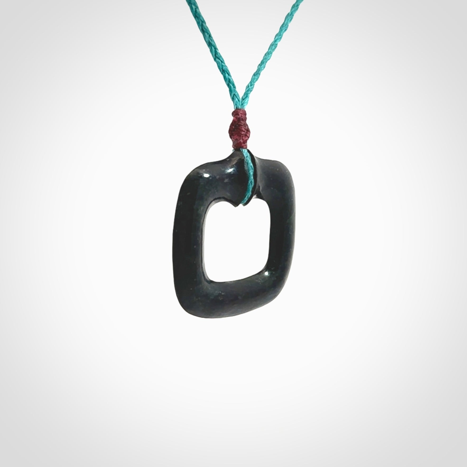 Contemporary pendant hand carved from Australian Black Jade. Designed and made by NZ Pacific. All hand carved in Black Jade and provided with adjustable cords.
