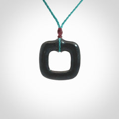 Contemporary pendant hand carved from Australian Black Jade. Designed and made by NZ Pacific. All hand carved in Black Jade and provided with adjustable cords.