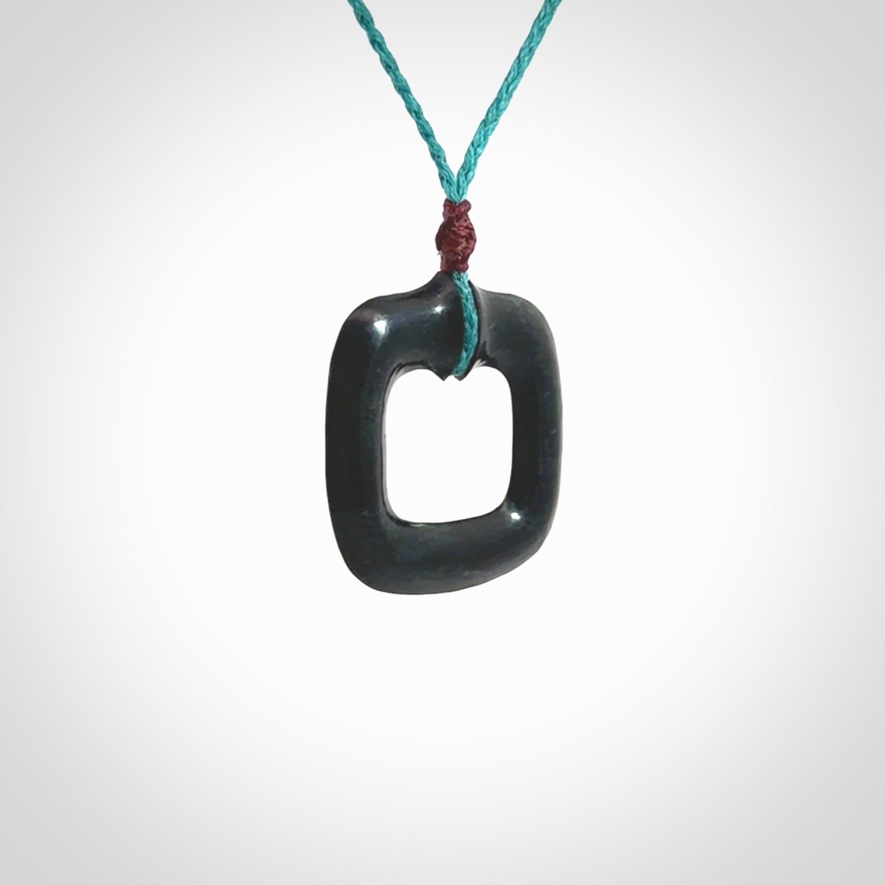 Contemporary pendant hand carved from Australian Black Jade. Designed and made by NZ Pacific. All hand carved in Black Jade and provided with adjustable cords.