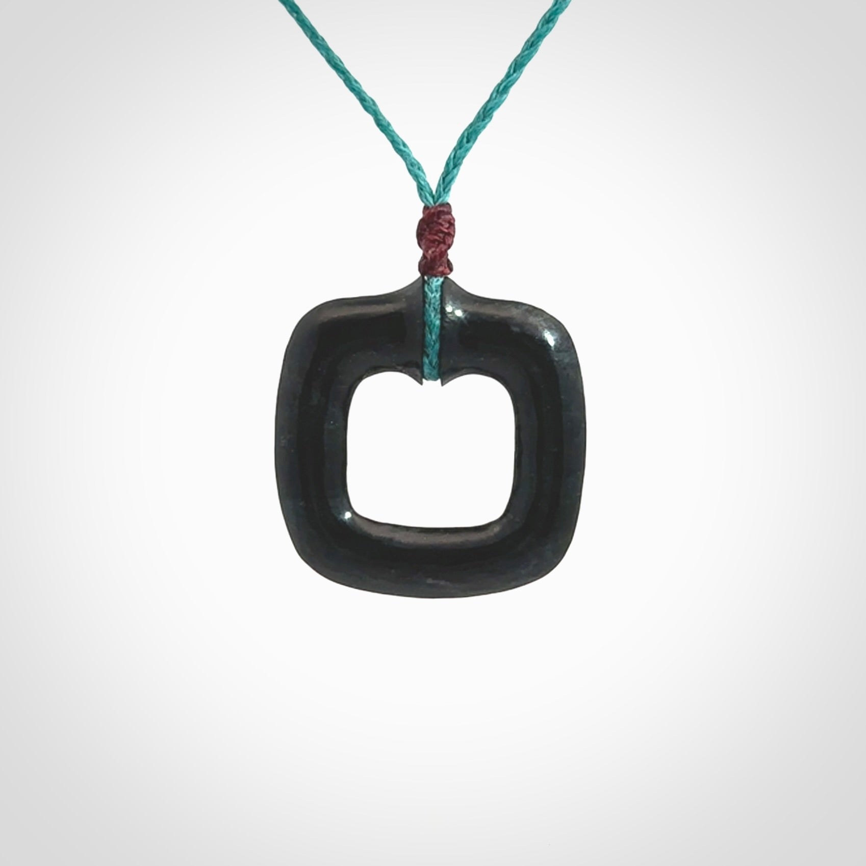 Contemporary pendant hand carved from Australian Black Jade. Designed and made by NZ Pacific. All hand carved in Black Jade and provided with adjustable cords.