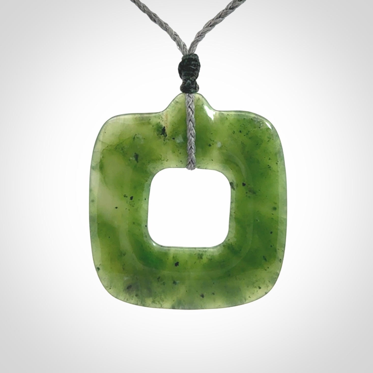 Hand carved British Columbian jade pendant. Carved by NZ Pacific from British Columbian jade. This is a modern, contemporary pendant made from natural materials.