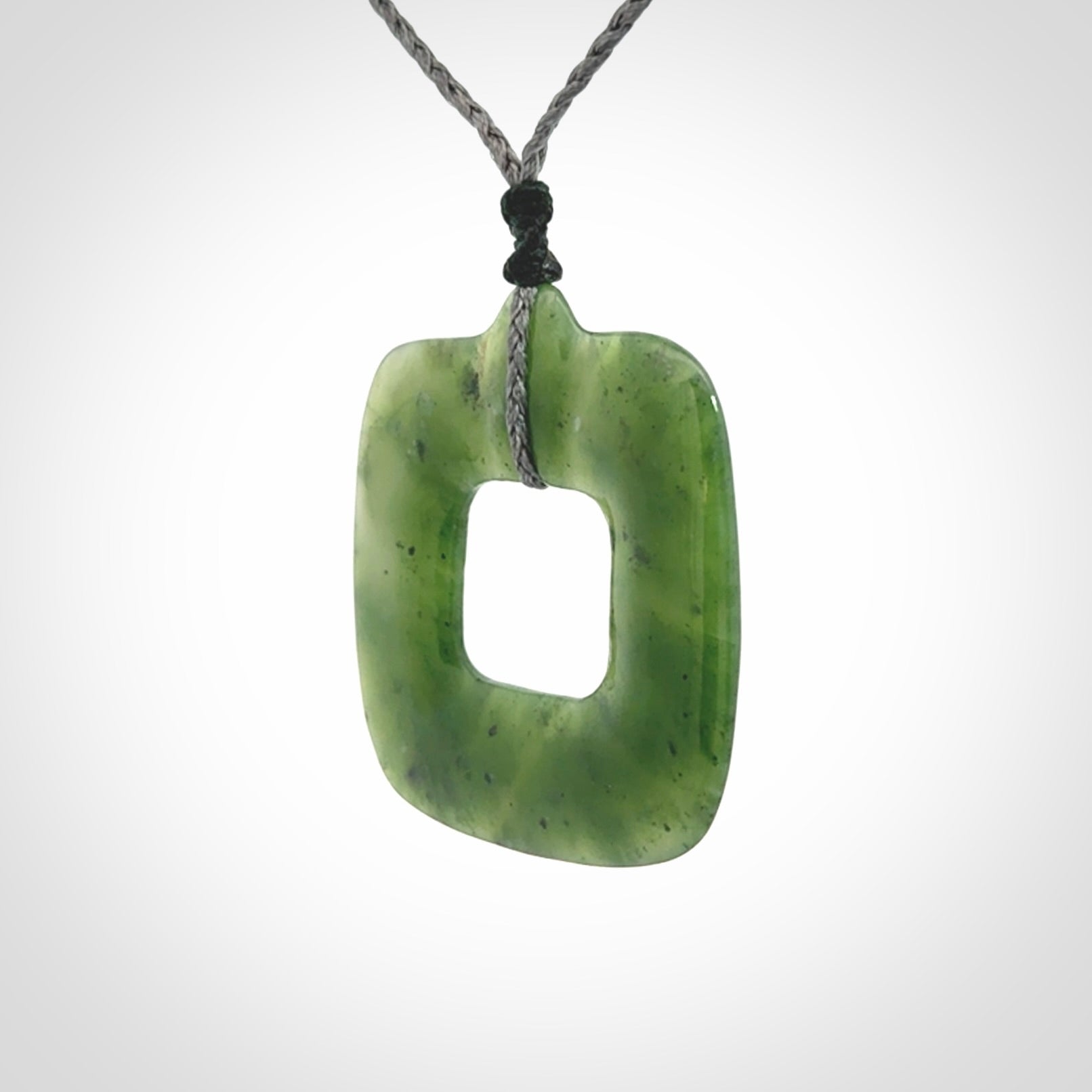 Hand carved British Columbian jade pendant. Carved by NZ Pacific from British Columbian jade. This is a modern, contemporary pendant made from natural materials.