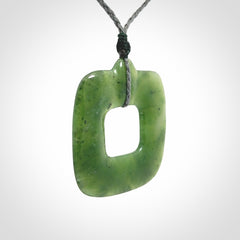Hand carved British Columbian jade pendant. Carved by NZ Pacific from British Columbian jade. This is a modern, contemporary pendant made from natural materials.
