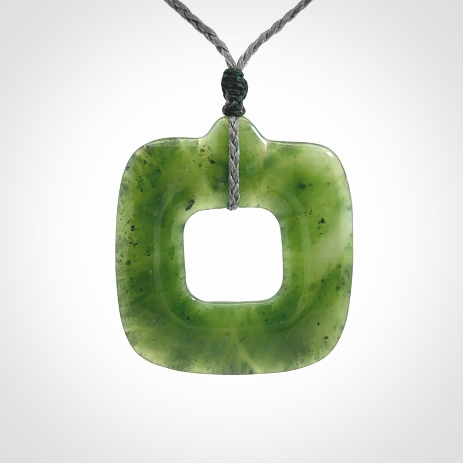 Hand carved British Columbian jade pendant. Carved by NZ Pacific from British Columbian jade. This is a modern, contemporary pendant made from natural materials.