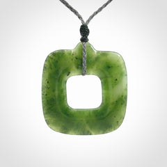 Hand carved British Columbian jade pendant. Carved by NZ Pacific from British Columbian jade. This is a modern, contemporary pendant made from natural materials.