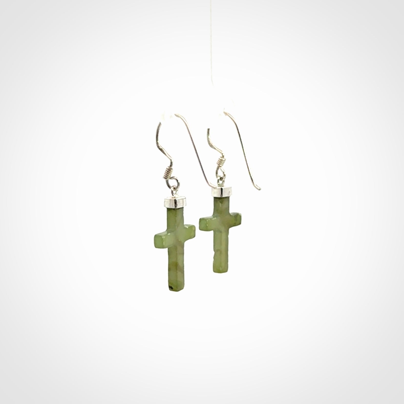 Hand carved medium Nephrite jade cross earrings. Made by NZ Pacific from real jade. Online jewellery for sale online by NZ Pacific.