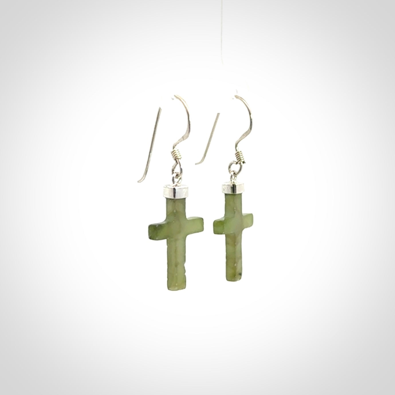 Hand carved medium Nephrite jade cross earrings. Made by NZ Pacific from real jade. Online jewellery for sale online by NZ Pacific.