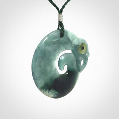 Guatemalan Jadeite Koru Manaia pendant. Made in New Zealand. Real Jade, pounamu. Real New Zealand Jade Manaia with Koru necklace with a polished finish.