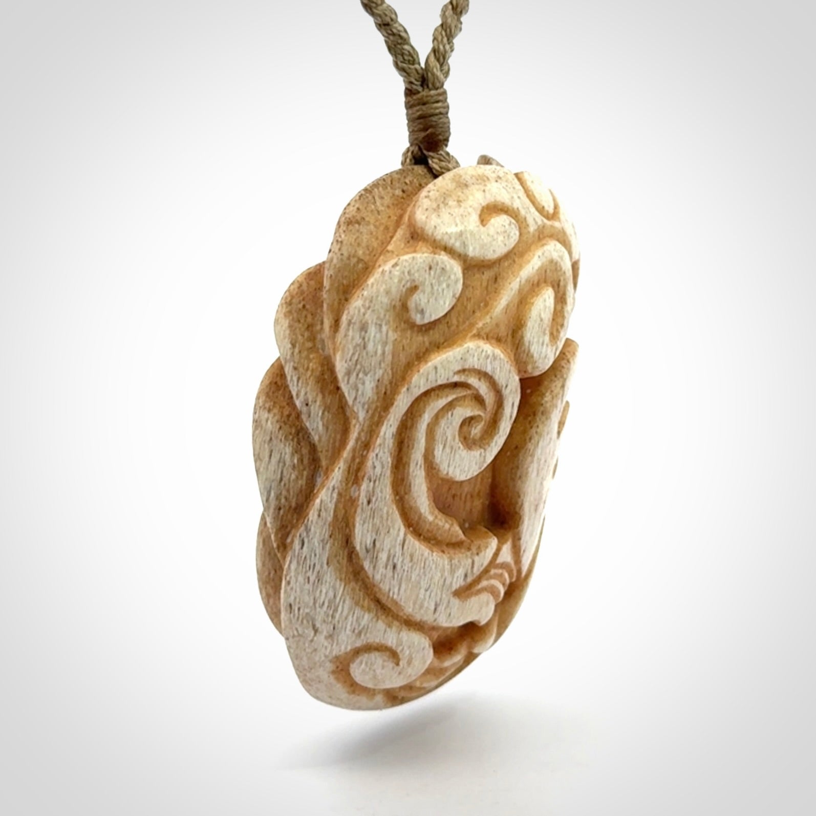 Stand Out Art to Wear! Hand Carved in Whale Bone