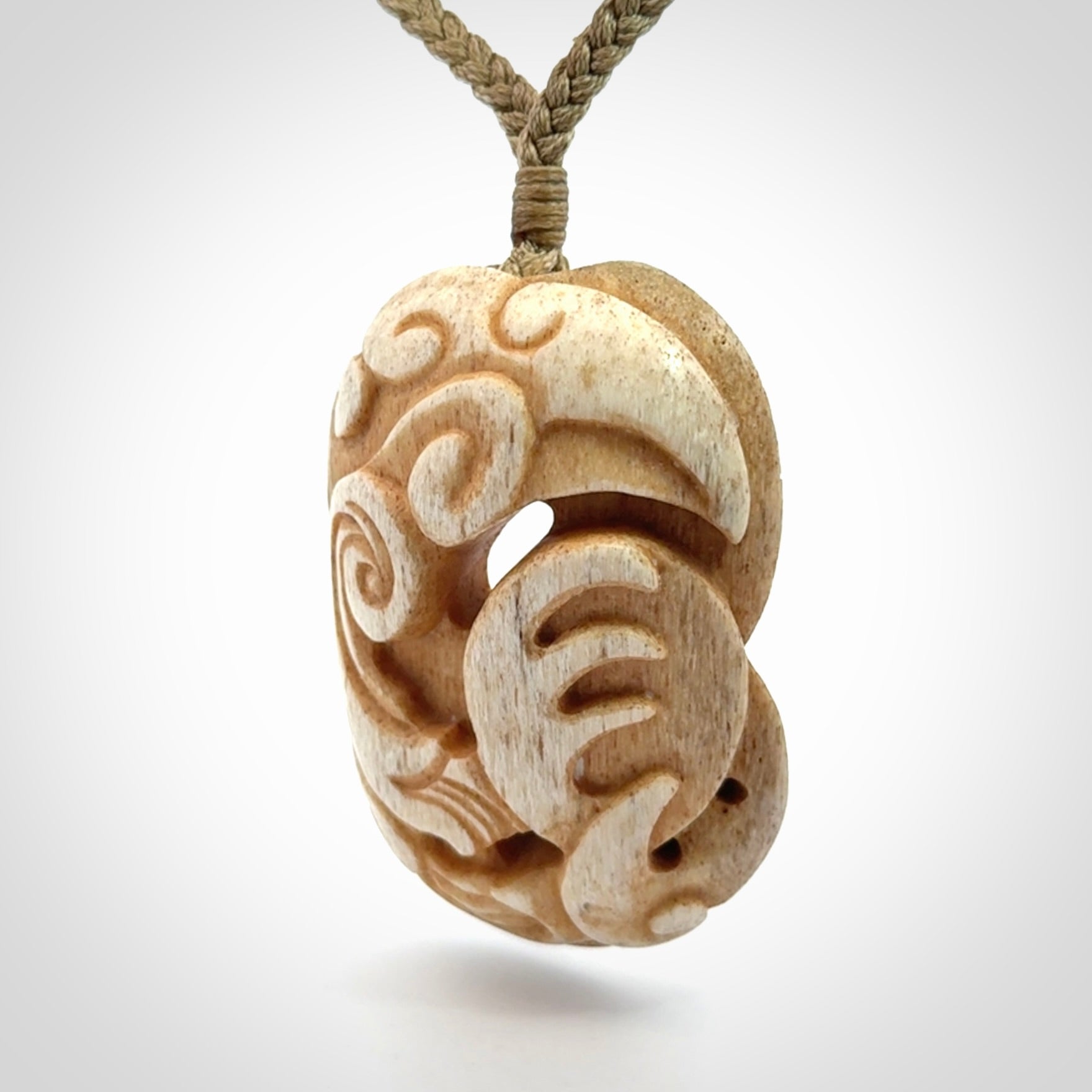 Stand Out Art to Wear! Hand Carved in Whale Bone