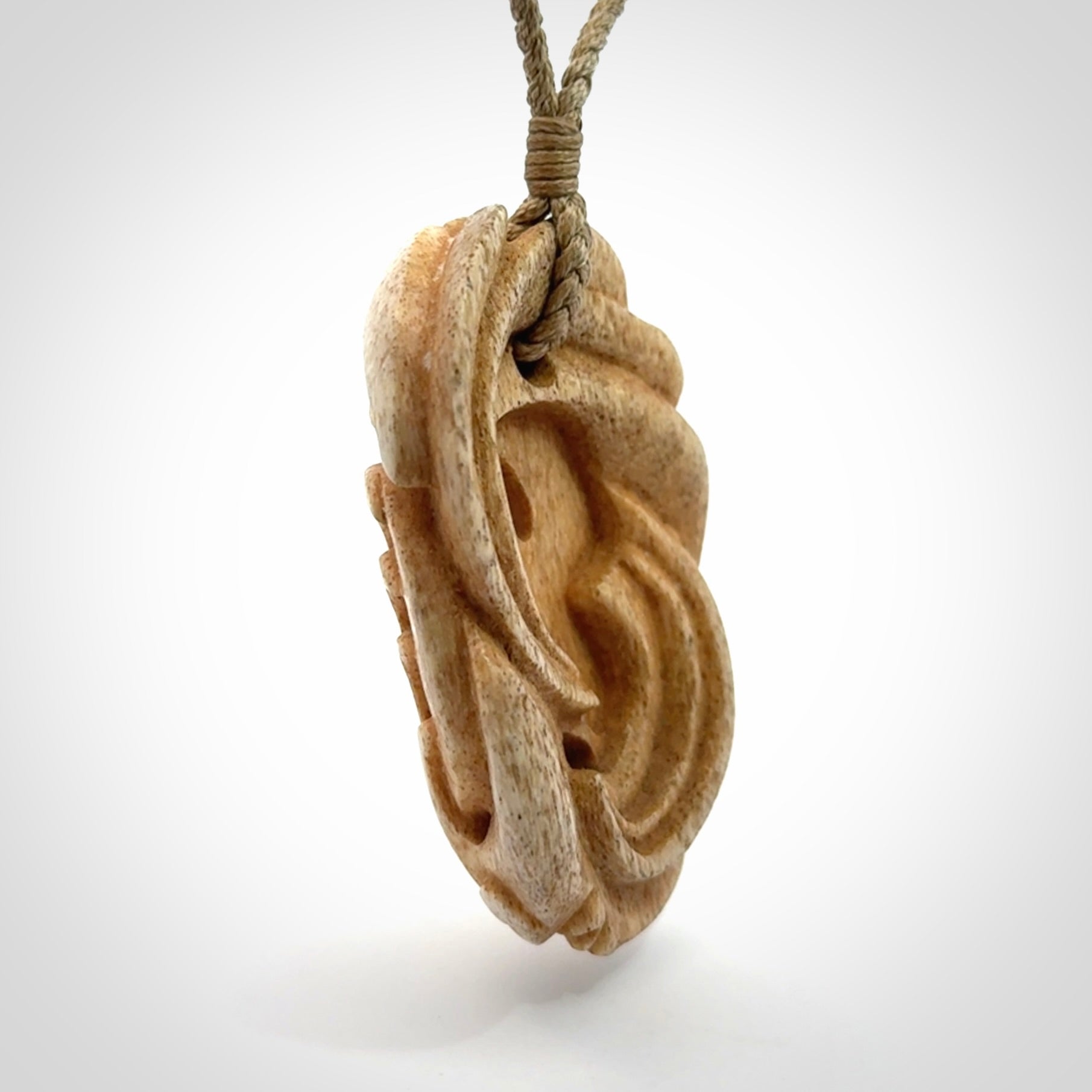 Stand Out Art to Wear! Hand Carved in Whale Bone