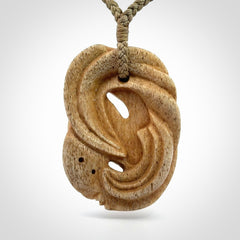 Stand Out Art to Wear! Hand Carved in Whale Bone