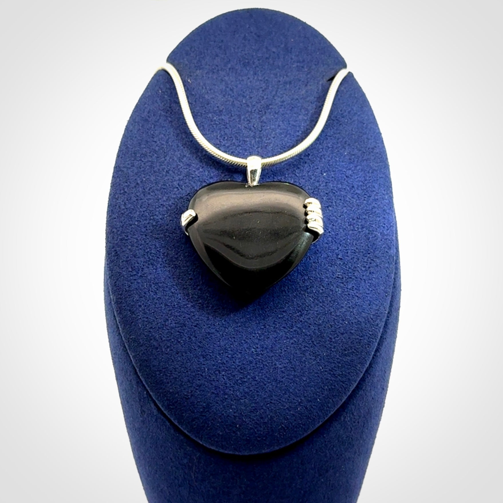 Hand carved black jade and sterling silver heart pendant