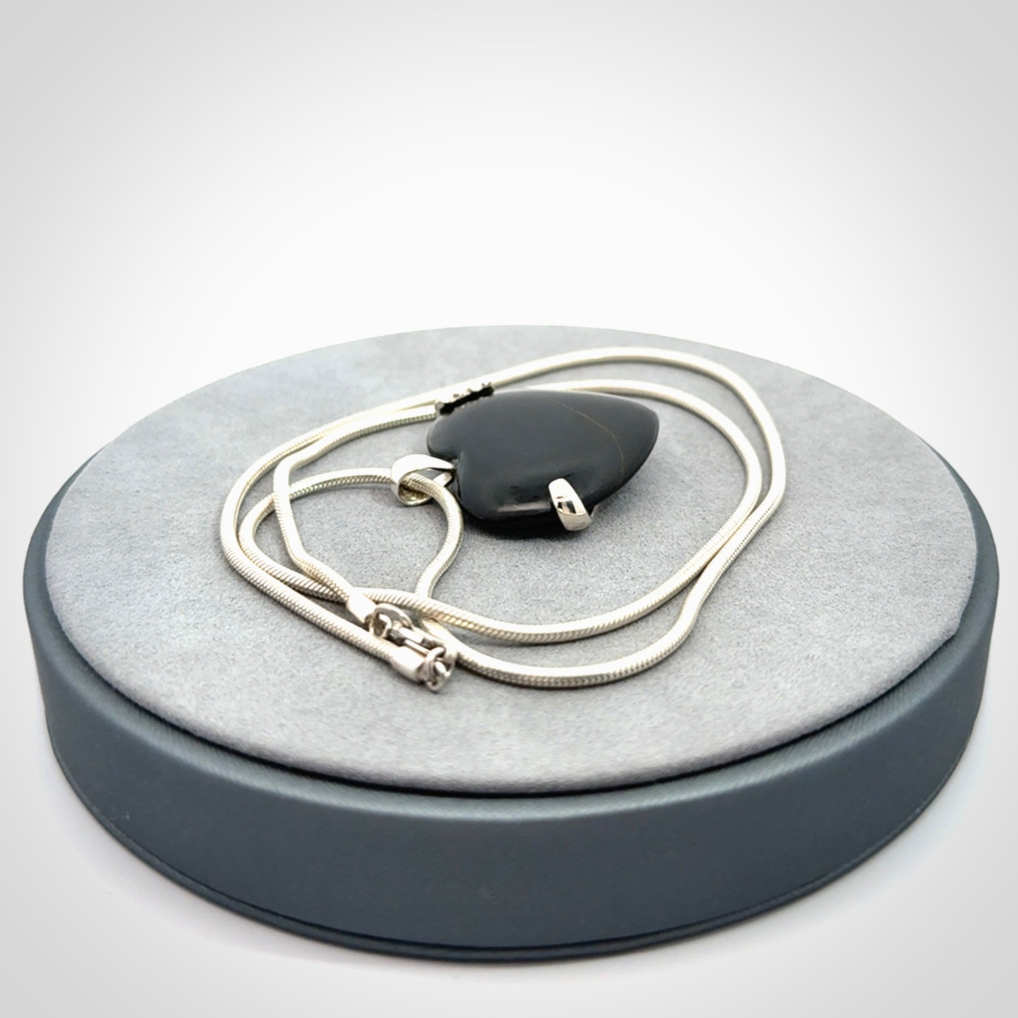 Hand carved black jade and sterling silver heart pendant