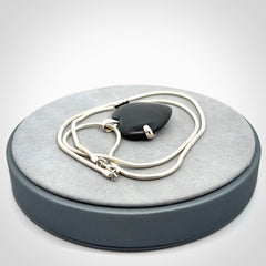 Hand carved black jade and sterling silver heart pendant
