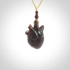 This pendant is handcrafted from rare Amber. It replicates a human heart. It is supplied with an adjustable oat cord.