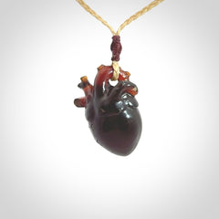 This pendant is handcrafted from rare Amber. It replicates a human heart. It is supplied with an adjustable oat cord.