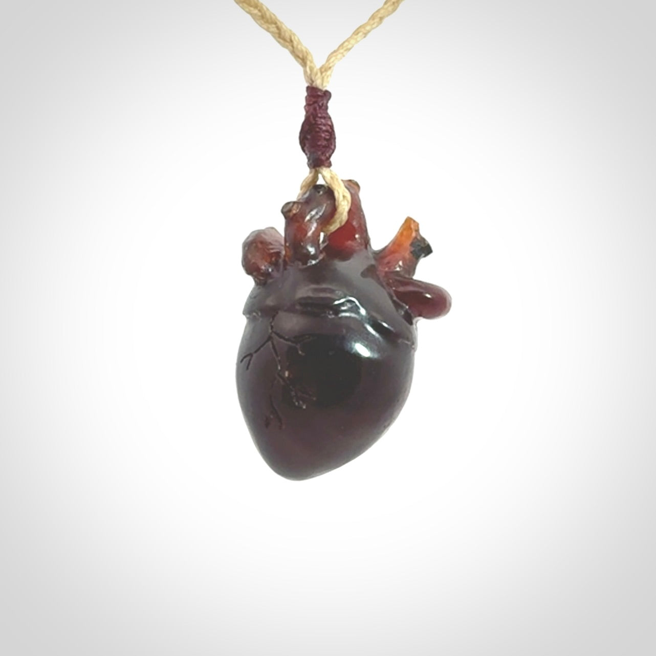 This pendant is handcrafted from rare Amber. It replicates a human heart. It is supplied with an adjustable oat cord.