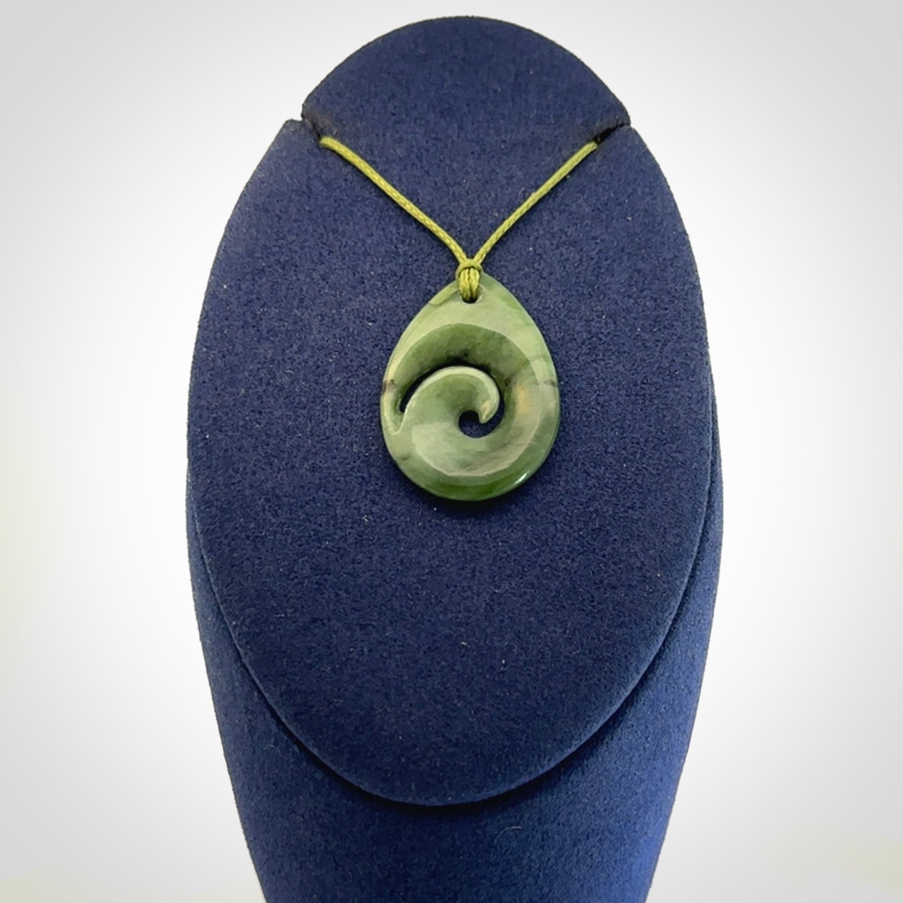 Hand carved New Zealand Jade koru drop pendants