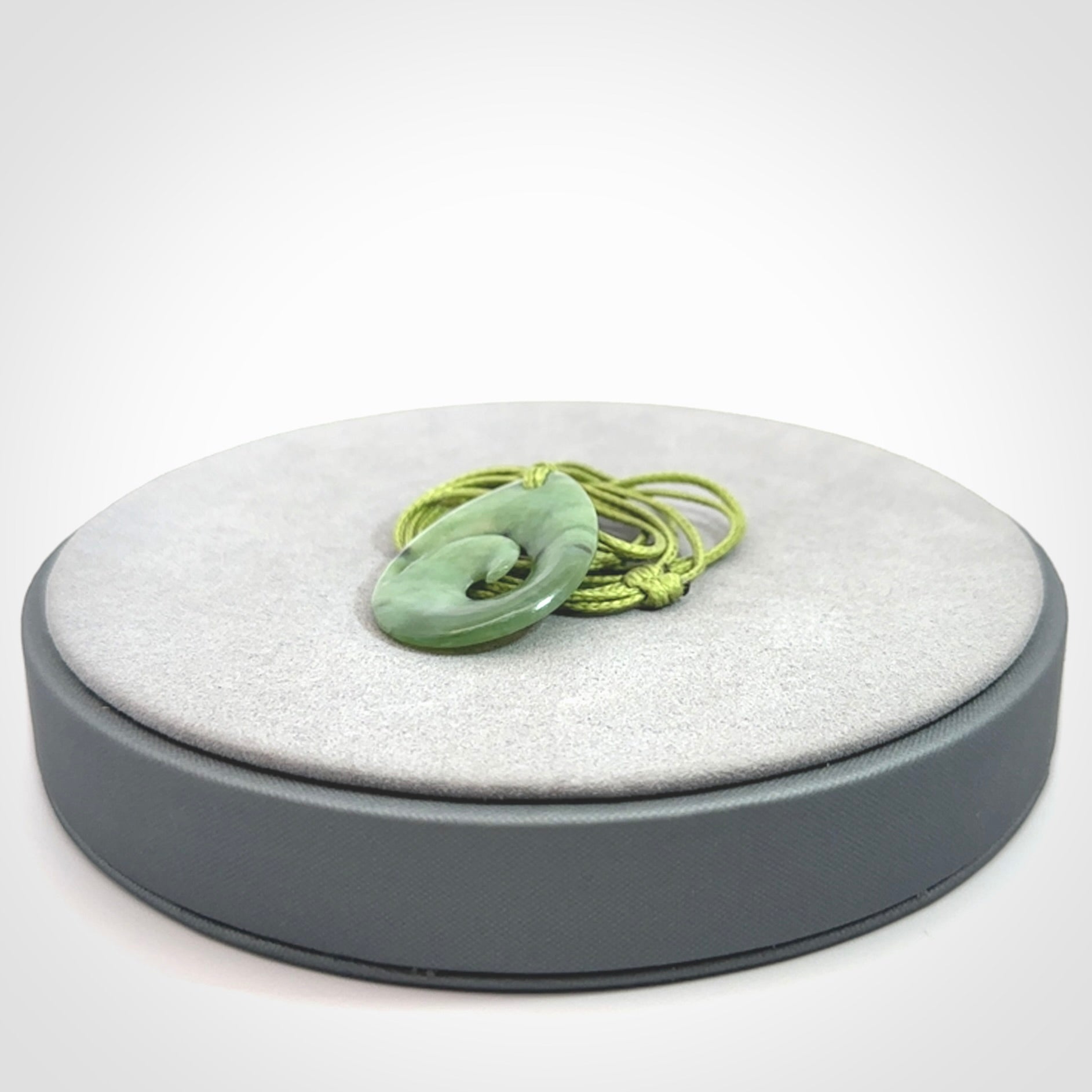 Hand carved New Zealand Jade koru drop pendants