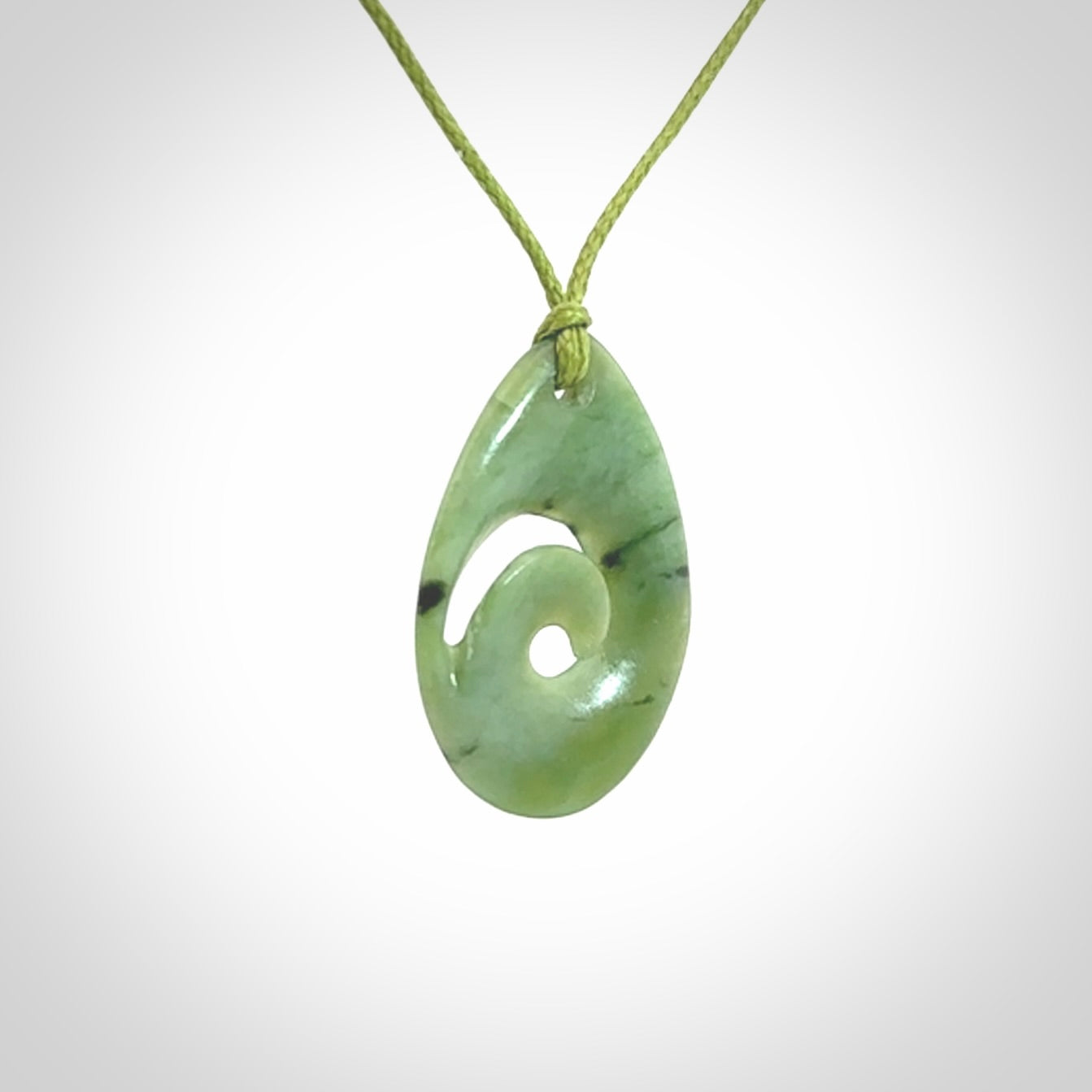 Hand carved New Zealand Jade koru drop pendants