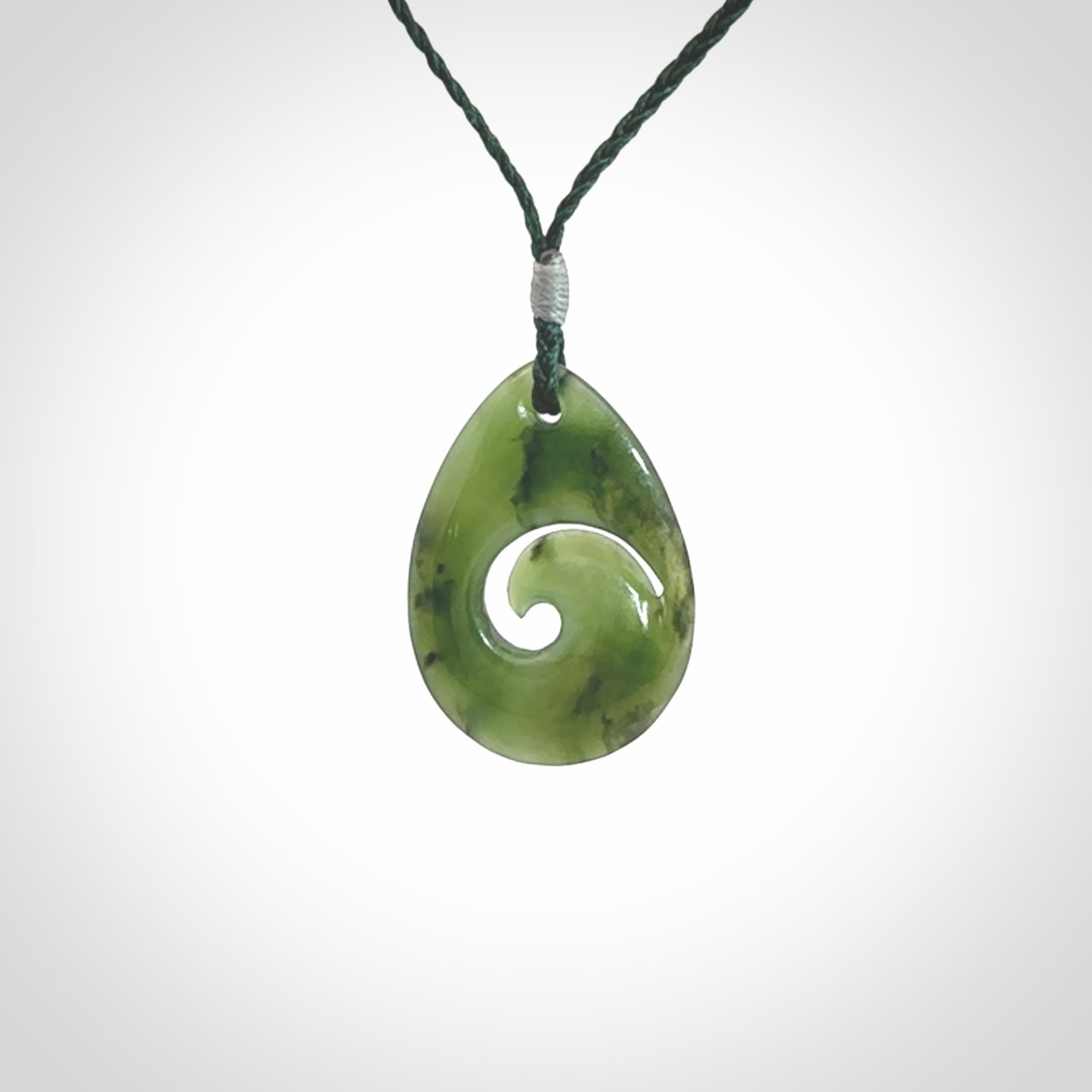 Hand carved New Zealand Jade koru drop pendants