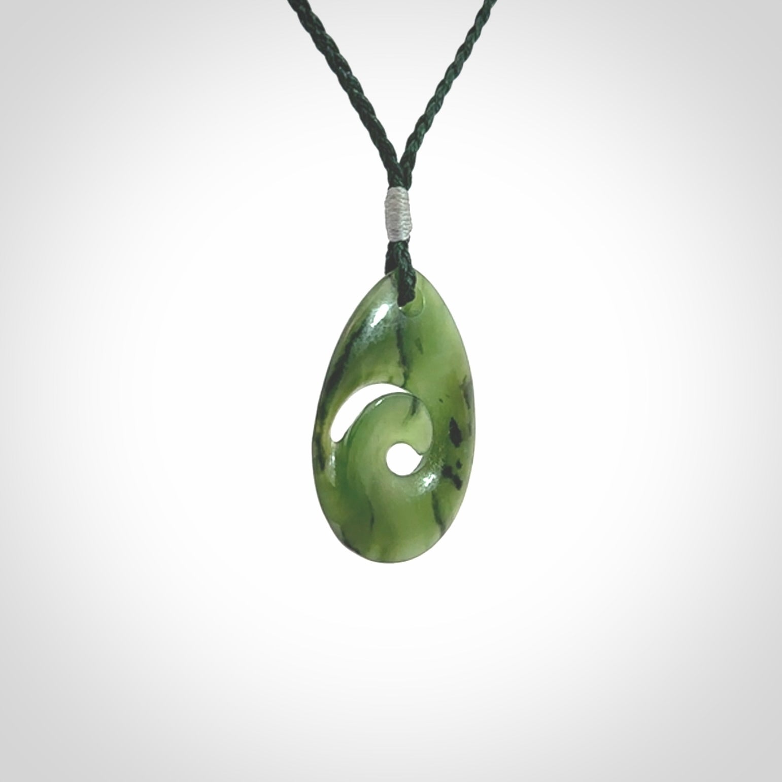 Hand carved New Zealand Jade koru drop pendants
