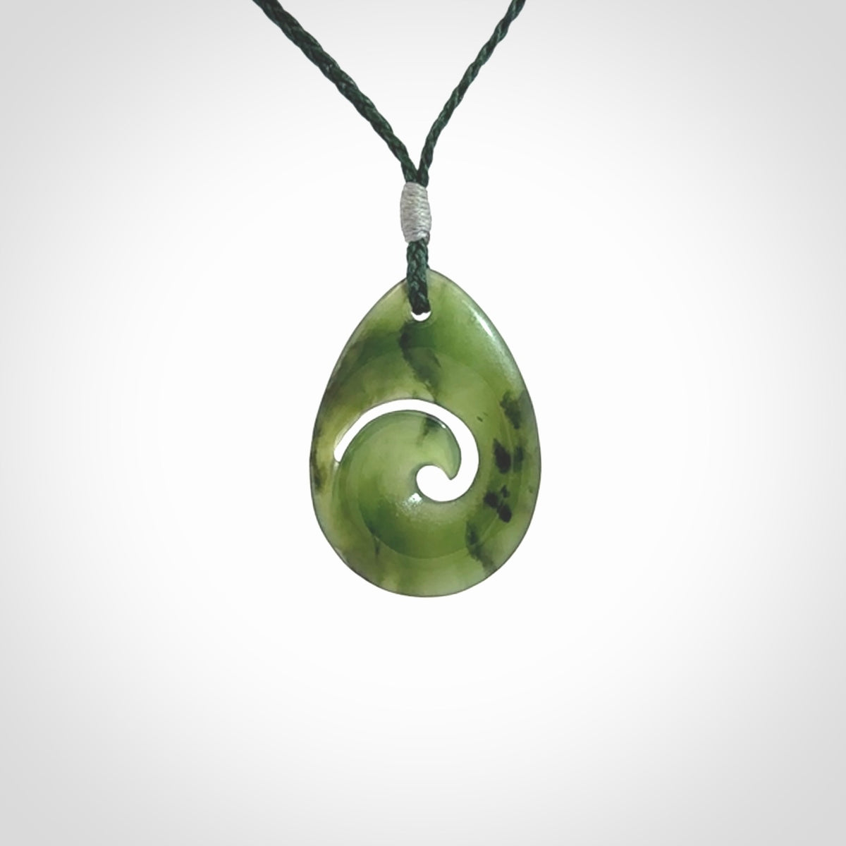 Hand carved New Zealand Jade koru drop pendants