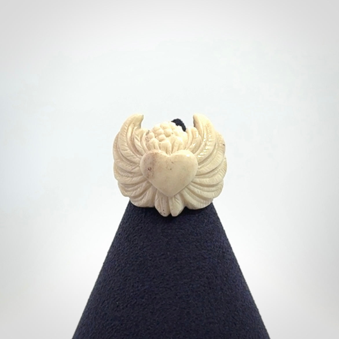Hand carved deer antler bone winged heart ring.