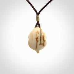 Hand carved mammoth tusk goddess pendant. Hand carved Mammoth Tusk jewellery for sale online by NZ Pacific. Delivered with a fine adjustable cord and packaged in a woven kete pouch.