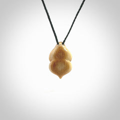 Hand carved mammoth tusk goddess pendant. Hand carved Mammoth Tusk jewellery for sale online by NZ Pacific. Delivered with a fine adjustable cord and packaged in a woven kete pouch.