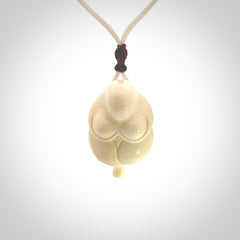 Hand carved mammoth tusk goddess pendant. Hand carved Mammoth Tusk jewellery for sale online by NZ Pacific. Delivered with a fine adjustable cord and packaged in a woven kete pouch.
