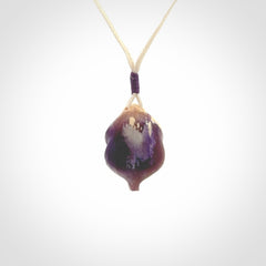 Hand carved mammoth tusk goddess pendant. Hand carved Mammoth Tusk jewellery for sale online by NZ Pacific. Delivered with a fine adjustable cord and packaged in a woven kete pouch.