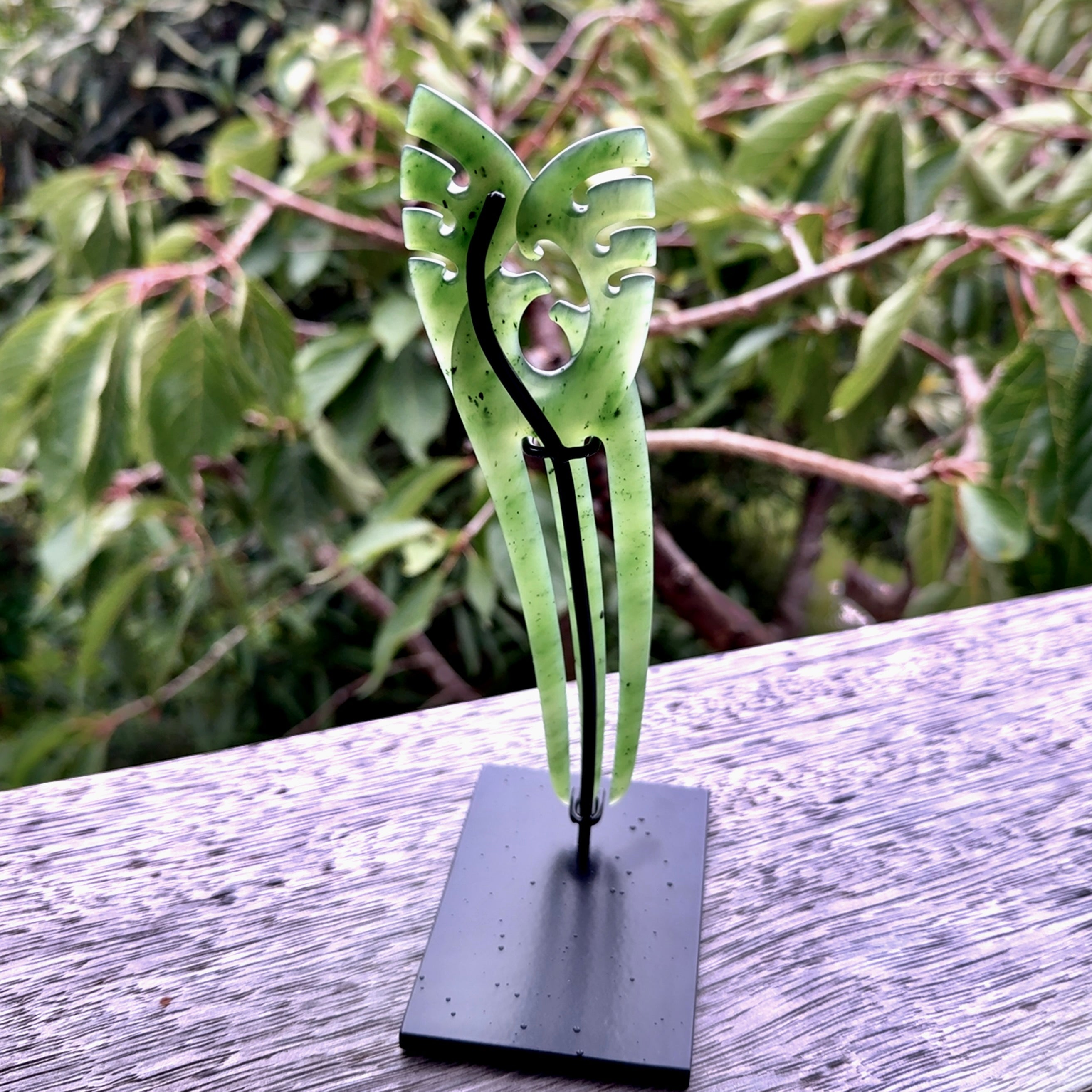 A hand carved New Zealand Jade Heru comb. A large hand made Heru comb  by New Zealand artist Kerry Thompson. Kerry has carved two Haast eagles at the top of the comb - this is an exquisite work of art and would be perfect for an enthusiasts collection.