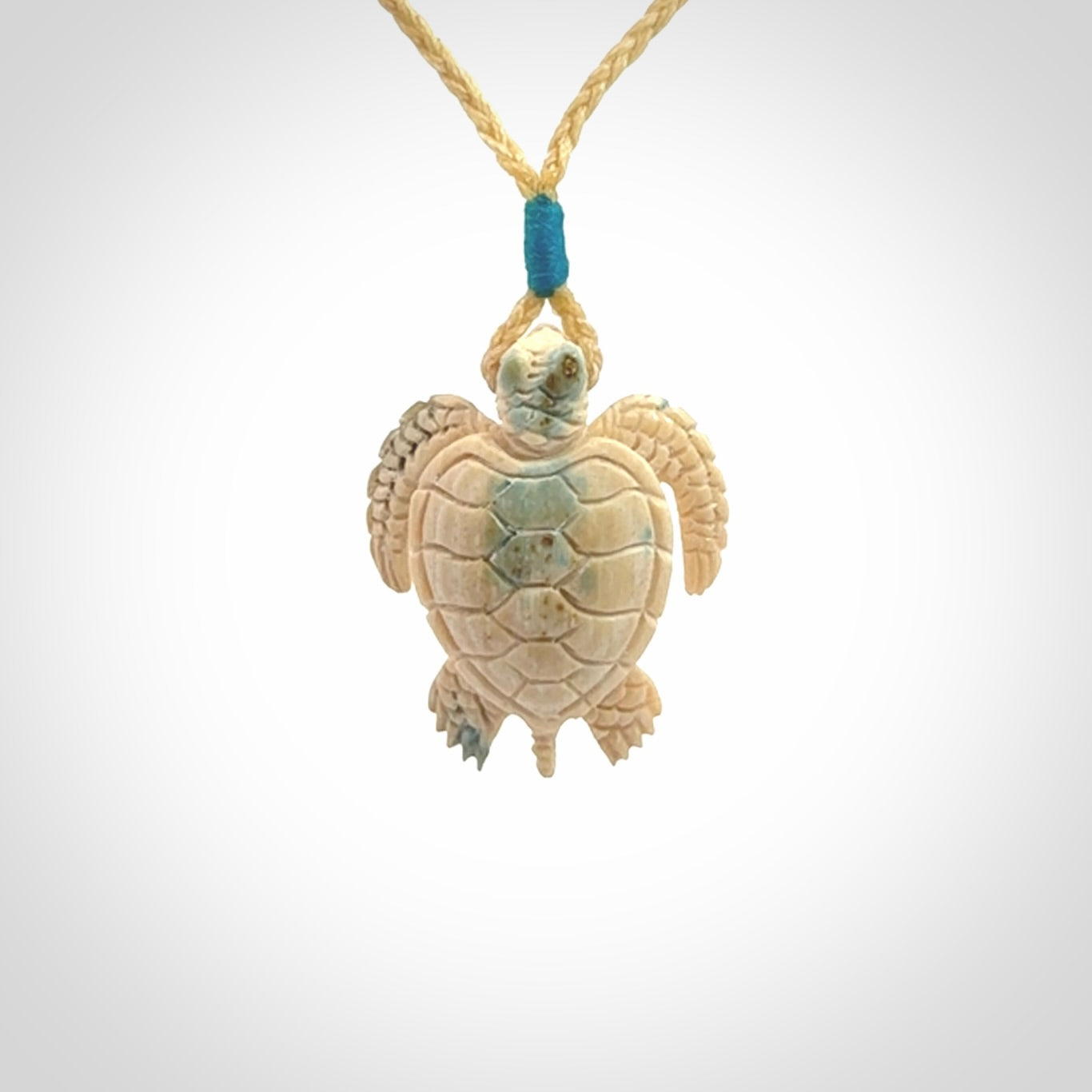 This is a beautiful hand carved woolly mammoth tusk turtle pendant. A really cool piece that is made from this rare and beautiful material. The mammoth has a very distinctive grain and each piece is different. We ship this worldwide and the cost of shipping is included in the price.