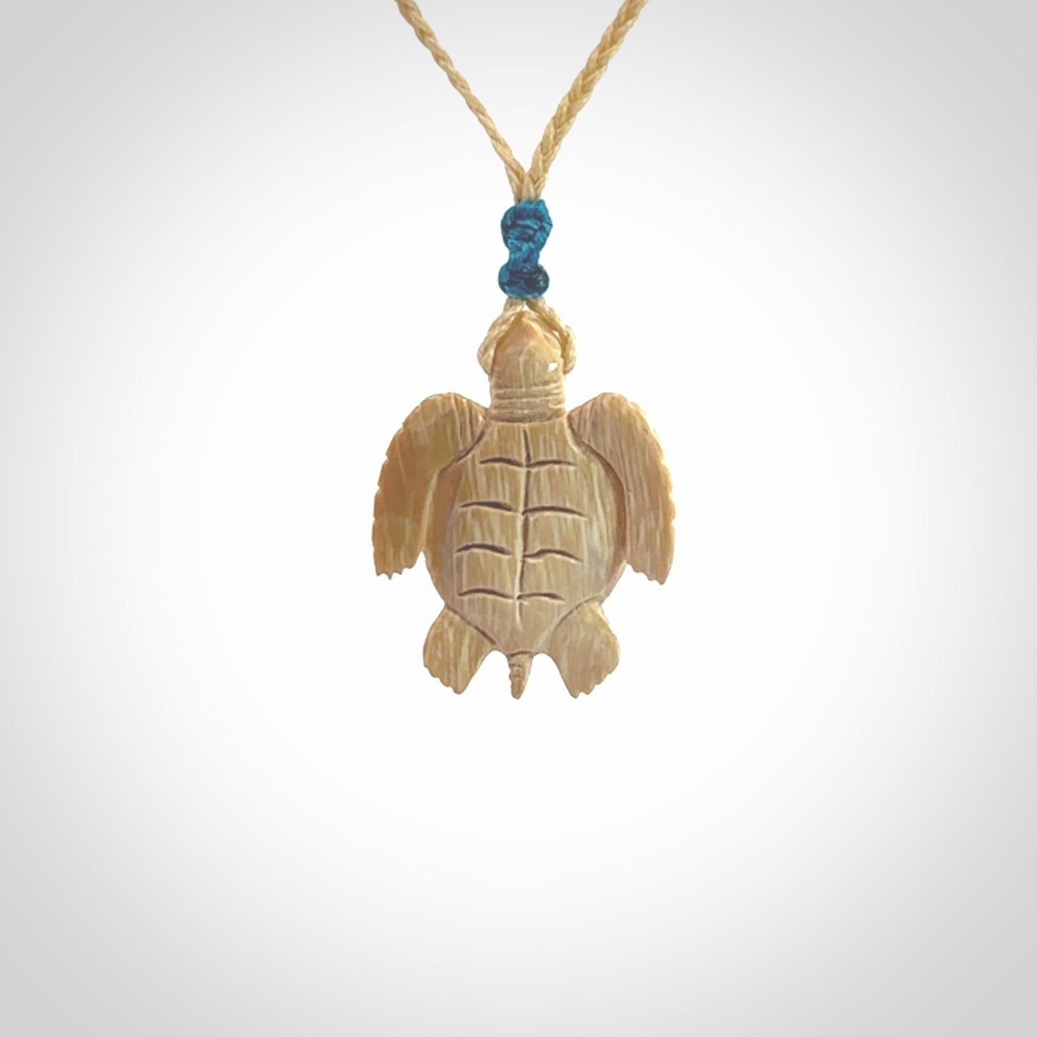 This is a beautiful hand carved woolly mammoth tusk turtle pendant. A really cool piece that is made from this rare and beautiful material. The mammoth has a very distinctive grain and each piece is different. We ship this worldwide and the cost of shipping is included in the price.