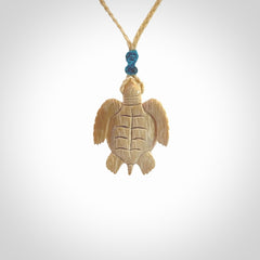 This is a beautiful hand carved woolly mammoth tusk turtle pendant. A really cool piece that is made from this rare and beautiful material. The mammoth has a very distinctive grain and each piece is different. We ship this worldwide and the cost of shipping is included in the price.