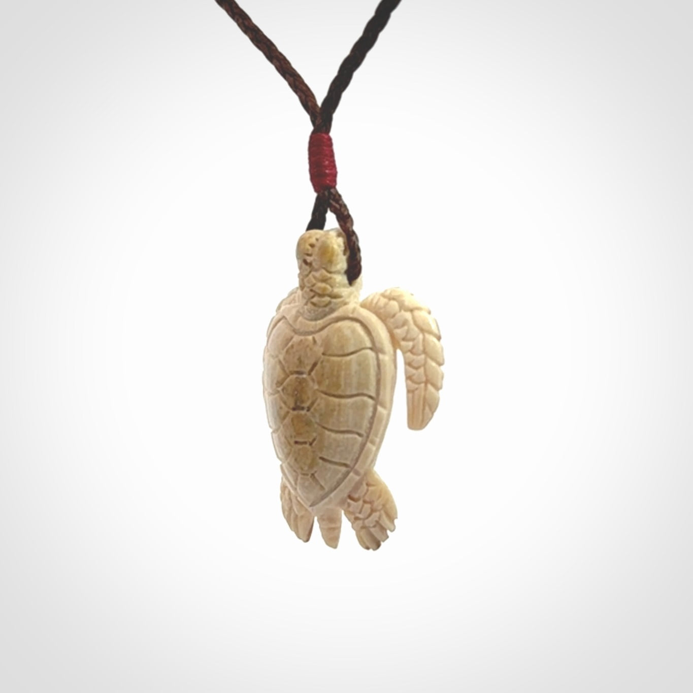 This is a beautiful hand carved woolly mammoth tusk turtle pendant. A really cool piece that is made from this rare and beautiful material. The mammoth has a very distinctive grain and each piece is different. We ship this worldwide and the cost of shipping is included in the price.