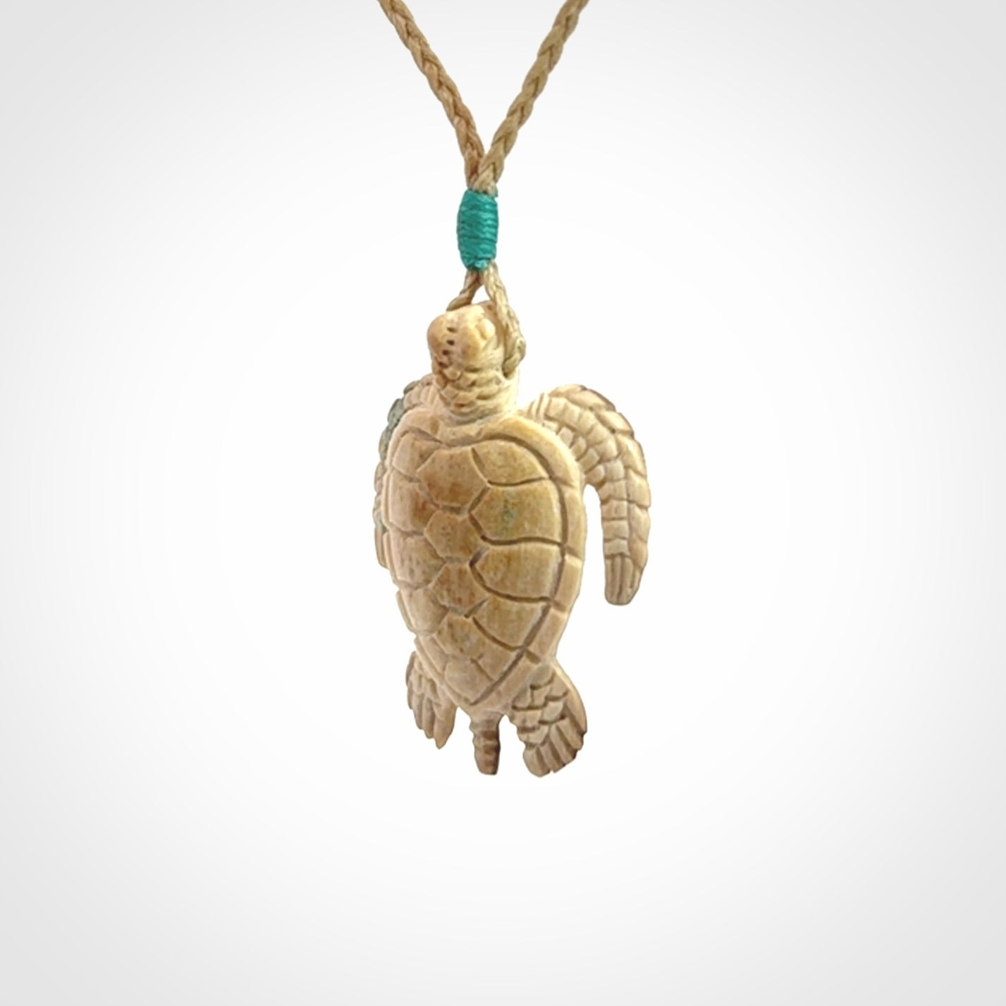 This is a beautiful hand carved woolly mammoth tusk turtle pendant. A really cool piece that is made from this rare and beautiful material. The mammoth has a very distinctive grain and each piece is different. We ship this worldwide and the cost of shipping is included in the price.